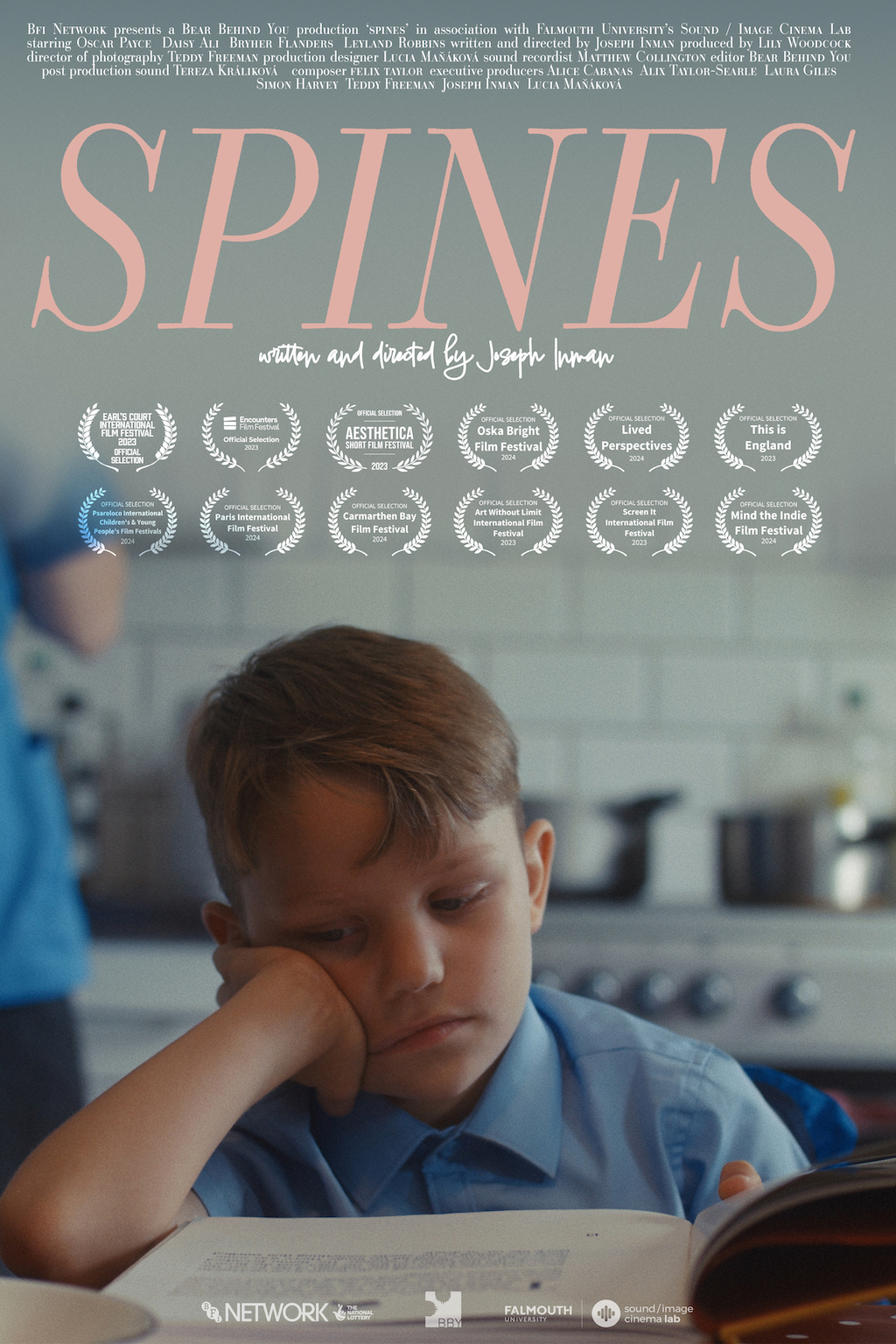 Spines poster. Boy sitting by the table.